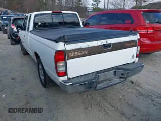 1999 Nissan Frontier XE with VIN 1N6DD26SXXC324508, listed as a IAAI auction lot 41521674 with 297,239 mi miles and . Bid and sale history available at DreamBid. Image 3.