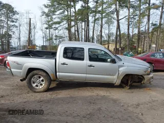2005 Toyota Tacoma z VIN 5TELU42N55Z069789, wystawiony jako IAAI lot #41320317 z przebiegiem 198 262 mil mil oraz . Historia ofert i sprzedaży dostępna na DreamBid. Obrazek 12.