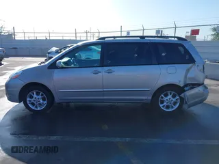 2006 Toyota Sienna XLE with VIN 5TDZA22C06S509177, listed as a IAAI auction lot 41033240 with 163,323 mi miles. Bid and sale history available at carsss.com. Image 14.