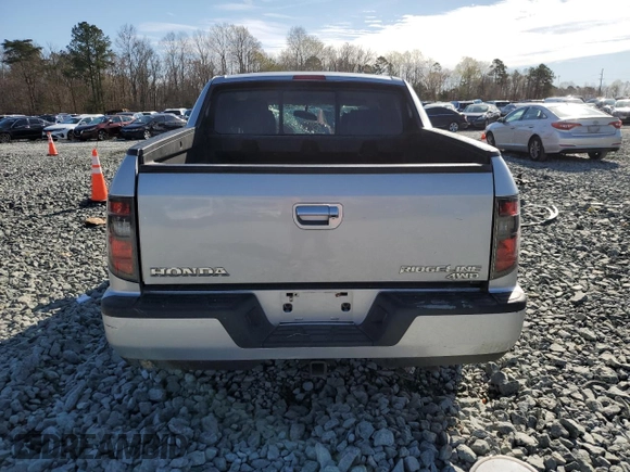 2013 Honda Ridgeline Sport z VIN 5FPYK1F70DB018035, wystawiony jako Copart lot #50519355 z przebiegiem Nie podano mil oraz Szkoda całkowita • Salvage title. Historia ofert i sprzedaży dostępna na DreamBid. Obrazek 6.