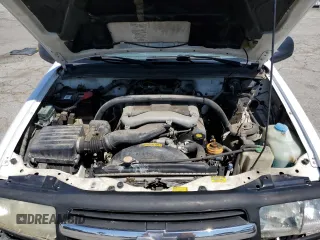 2001 Chevrolet Tracker ZR2 z VIN 2CNBJ734816935414, wystawiony jako Copart lot #54877235 z przebiegiem 117 483 mil mil oraz Szkoda całkowita • Salvage title. Historia ofert i sprzedaży dostępna na DreamBid. Obrazek 12.