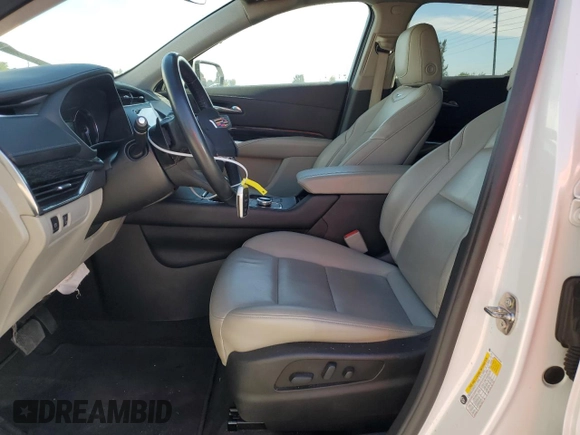 2022 Cadillac XT4 FWD Premium Luxury with VIN 1GYFZCR45NF100049, listed as a Copart auction lot 50213255 with 62,391 mi miles and Salvage title. Bid and sale history available at DreamBid. Image 7.