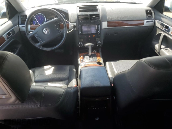 2010 Volkswagen Touareg VR6 with VIN WVGBF7A97AD004355, listed as a Copart auction lot 52861335 with 129,454 mi miles and Salvage Title. Bid and sale history available at DreamBid. Image 8.