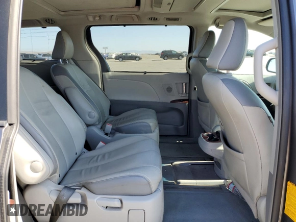 2014 Toyota Sienna Limited with VIN 5TDDK3DC0ES081720, listed as a Copart auction lot 63143875 with 213,928 mi miles and Clean title. Bid and sale history available at DreamBid. Image 11.