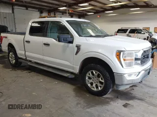 2021 Ford F-150 XL with VIN 1FTFW1E82MFB31401, listed as a IAAI auction lot 41974324 with 112,933 mi miles. Bid and sale history available at carsss.com. Image 1.