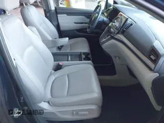 2020 Honda Odyssey Touring with VIN 5FNRL6H82LB015715, listed as a IAAI auction lot 41915849 with 69,603 mi miles and . Bid and sale history available at DreamBid. Image 5.