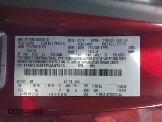 2015 Ford Escape Titanium with VIN 1FMCU9J91FUA97855, listed as a IAAI auction lot 41689650 with 125,487 mi miles. Bid and sale history available at carsss.com. Image 9.