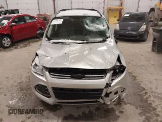 2014 Ford Escape SE z VIN 1FMCU9GX1EUD67624, wystawiony jako IAAI lot #41986362 z przebiegiem 79 921 mil mil oraz . Historia ofert i sprzedaży dostępna na DreamBid. Obrazek 12.