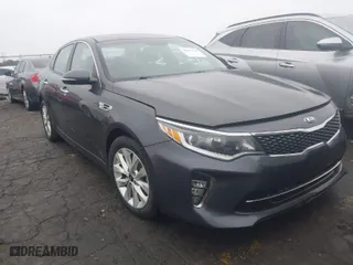 2018 Kia Optima S with VIN 5XXGT4L35JG182491, listed as a IAAI auction lot 41475136 with 116,051 mi miles. Bid and sale history available at carsss.com. Image 1.