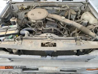 1988 Nissan Hardbody z VIN 1N6ND16S7JC395431, wystawiony jako Copart lot #86765244 z przebiegiem 99 134 mil mil oraz Tytuł czysty. Historia ofert i sprzedaży dostępna na DreamBid. Obrazek 11.
