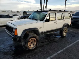 1996 Jeep Cherokee Sport with VIN 1J4FJ68S4TL202451, listed as a Copart auction lot 87317064 with 196,426 mi miles and Clean Title. Bid and sale history available at carsss.com. Image 1.