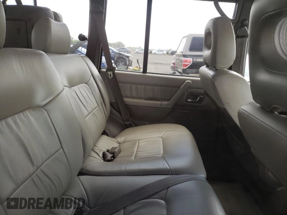 1998 Mitsubishi Montero z VIN JA4MR51RXWJ006418, wystawiony jako Copart lot #54878275 z przebiegiem 225 110 mil mil oraz Szkoda całkowita • Salvage title. Historia ofert i sprzedaży dostępna na DreamBid. Obrazek 11.