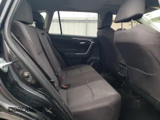 2019 Toyota RAV4 XLE with VIN JTMP1RFV9KD506960, listed as a Copart auction lot 50242025 with 102,157 mi miles and Salvage Title. Bid and sale history available at DreamBid. Image 11.
