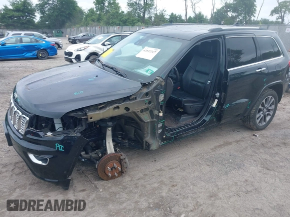 2018 Jeep Grand Cherokee High Altitude with VIN 1C4RJFCG0JC314389, listed as a IAAI auction lot 42512327 with 38,033 mi miles and . Bid and sale history available at DreamBid. Image 2.
