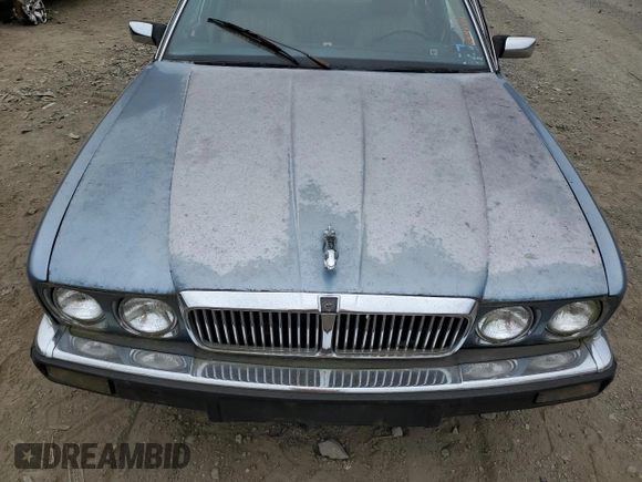1989 Jaguar XJ with VIN SAJHY1540KC578115, listed as a Copart auction lot 69142274 with Not Provided miles and Clean Title. Bid and sale history available at DreamBid. Image 11.