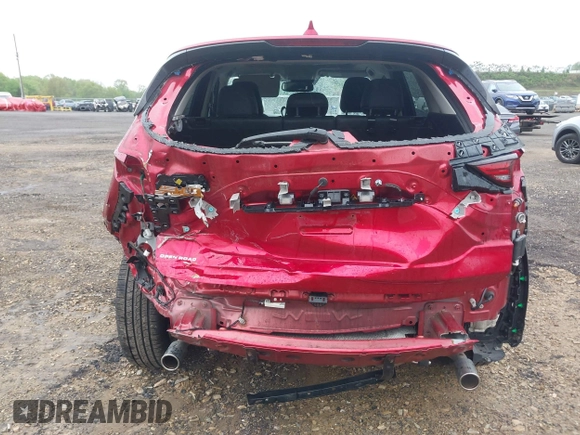 2020 Mazda CX-5 Grand Touring with VIN JM3KFBDM7L1731837, listed as a IAAI auction lot 42160795 with 63,826 mi miles and . Bid and sale history available at DreamBid. Image 6.