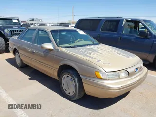 1994 Ford Taurus GL z VIN 1FALP52U9RG209348, wystawiony jako IAAI lot #42418772 z przebiegiem 81 838 mil mil oraz . Historia ofert i sprzedaży dostępna na DreamBid. Obrazek 1.
