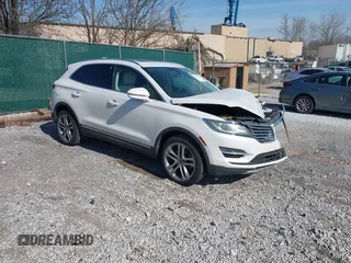 2015 Lincoln MKC with VIN 5LMCJ2A95FUJ30658, listed as a IAAI auction lot 41662064 with 95,922 mi miles. Bid and sale history available at carsss.com. Image 1.