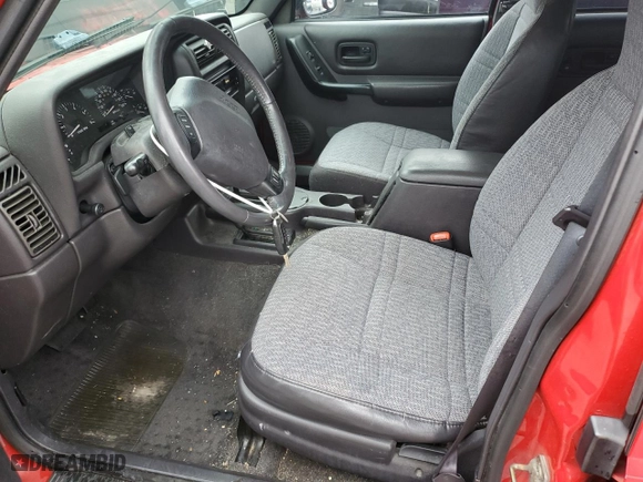 2001 Jeep Cherokee Sport with VIN 1J4FF48S61L568043, listed as a Copart auction lot 80671554 with 244,660 mi miles and Salvage Title. Bid and sale history available at carsss.com. Image 7.