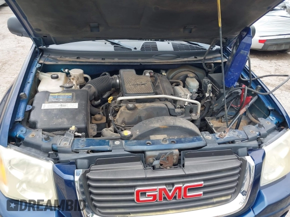 2003 GMC Envoy SLE z VIN 1GKDS13S432414698, wystawiony jako IAAI lot #42338640 z przebiegiem 210 988 mil mil oraz . Historia ofert i sprzedaży dostępna na DreamBid. Obrazek 10.