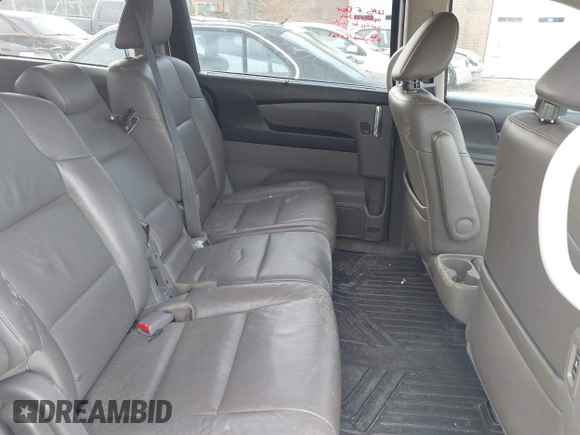 2015 Honda Odyssey EX-L z VIN 5FNRL5H61FB055684, wystawiony jako IAAI lot #42013480 z przebiegiem 221 381 mil mil oraz . Historia ofert i sprzedaży dostępna na DreamBid. Obrazek 8.