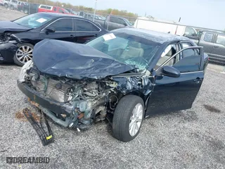 2013 Toyota Camry Hybrid LE with VIN 4T1BD1FK5DU076612, listed as a IAAI auction lot 42000025 with 210,000 mi miles. Bid and sale history available at carsss.com. Image 19.