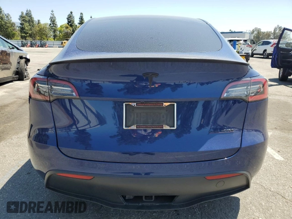 2021 Tesla Model Y Performance z VIN 5YJYGDEF0MF157795, wystawiony jako Copart lot #57163245 z przebiegiem 62 598 mil mil oraz Szkoda całkowita • Salvage title. Historia ofert i sprzedaży dostępna na DreamBid. Obrazek 6.