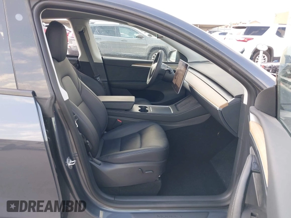 2023 Tesla Model Y Long Range with VIN 7SAYGDEEXPA078629, listed as a IAAI auction lot 42046354 with 27,245 mi miles and . Bid and sale history available at DreamBid. Image 5.