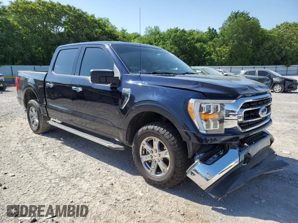 2021 Ford F-150 XL with VIN 1FTFW1E5XMFA47980, listed as a Copart auction lot 56737215 with 63,781 mi miles and Salvage title. Bid and sale history available at DreamBid. Image 4.