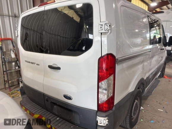 2016 Ford Transit Cargo z VIN 1FTYE1YM3GKB15532, wystawiony jako IAAI lot #42788480 z przebiegiem 64 600 mil mil oraz . Historia ofert i sprzedaży dostępna na DreamBid. Obrazek 14.