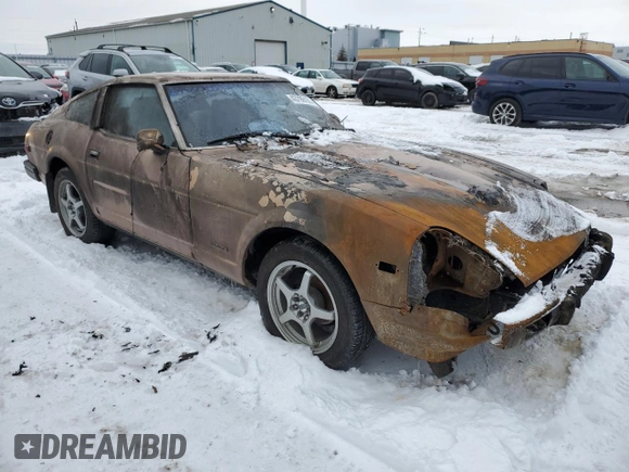 1979 Datsun 280ZX z VIN HS130137808, wystawiony jako Copart lot #43799165 z przebiegiem 28 995 mil mil oraz Tytuł czysty. Historia ofert i sprzedaży dostępna na DreamBid. Obrazek 4.
