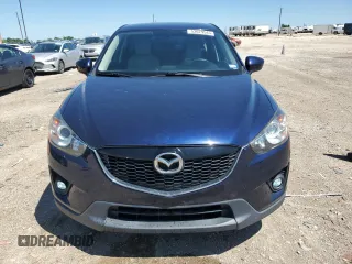 2014 Mazda CX-5 Touring with VIN JM3KE2CY7E0362879, listed as a Copart auction lot 53079545 with 70,863 mi miles and Salvage Title. Bid and sale history available at carsss.com. Image 5.