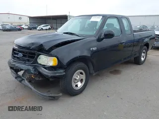 2002 Ford F-150 XL с VIN 1FTRX17242NB23323, выставлен на аукционе IAAI как лот 42363484 с пробегом Не указан миль и . История ставок и продаж доступна на DreamBid. Изображение 17.