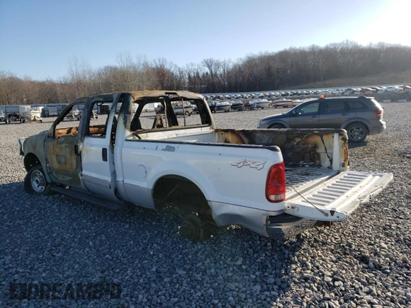 2001 Ford Super Duty F-250 XL with VIN 1FTNW21S01EA60395, listed as a Copart auction lot 84864984 with 0 mi miles and Salvage Title. Bid and sale history available at carsss.com. Image 2.