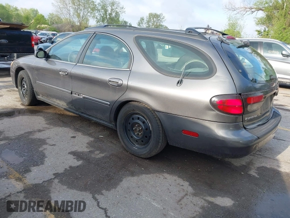 2003 Ford Taurus SE Standard with VIN 1FAFP58U63G117125, listed as a IAAI auction lot 42061812 with 172,154 mi miles. Bid and sale history available at carsss.com. Image 3.