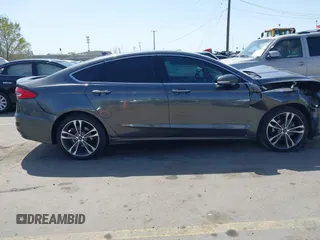 2019 Ford Fusion Titanium with VIN 3FA6P0D90KR109985, listed as a IAAI auction lot 41993329 with Not provided miles and . Bid and sale history available at DreamBid. Image 13.
