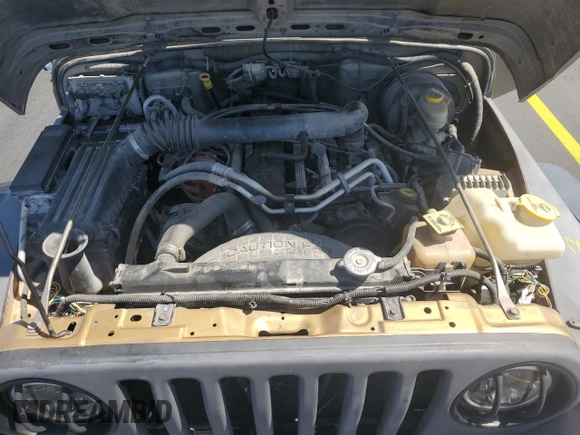 2003 Jeep Wrangler Sport z VIN 1J4FA49S43P327283, wystawiony jako Copart lot #59036295 z przebiegiem 158 108 mil mil oraz Szkoda całkowita • Salvage title. Historia ofert i sprzedaży dostępna na DreamBid. Obrazek 11.