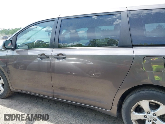 2012 Toyota Sienna with VIN 5TDKA3DCXCS012945, listed as a IAAI auction lot 42190015 with 114,372 mi miles and . Bid and sale history available at DreamBid. Image 14.