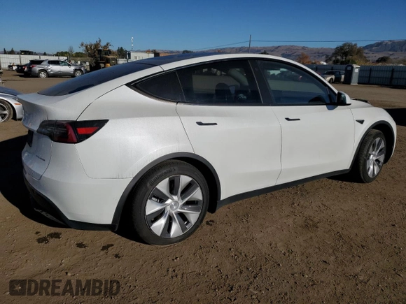 2020 Tesla Model Y Long Range with VIN 5YJYGDEE4LF015455, listed as a Copart auction lot 84223984 with 77,398 mi miles and Salvage Title. Bid and sale history available at DreamBid. Image 3.