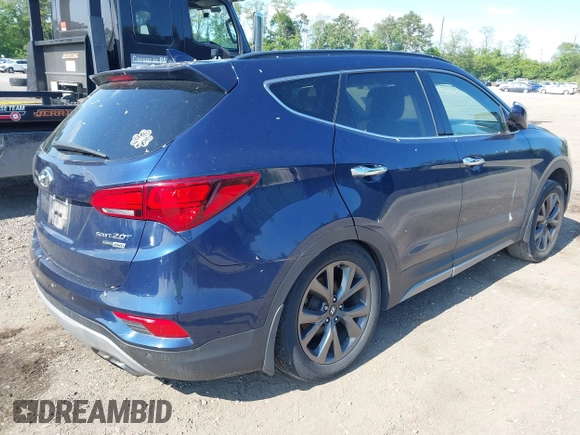 2018 Hyundai Santa Fe Ultimate with VIN 5XYZWDLA3JG571432, listed as a IAAI auction lot 42395245 with 69,330 mi miles and . Bid and sale history available at DreamBid. Image 4.
