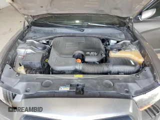 2012 Dodge Charger Police z VIN 2C3CDXAG9CH276820, wystawiony jako Copart lot #51369675 z przebiegiem 235 928 mil mil oraz Szkoda całkowita • Salvage title. Historia ofert i sprzedaży dostępna na DreamBid. Obrazek 11.