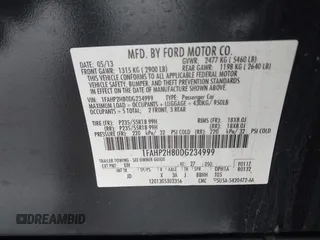 2013 Ford Taurus SEL with VIN 1FAHP2H80DG234999, listed as a IAAI auction lot 41577003 with 115,403 mi miles and . Bid and sale history available at DreamBid. Image 9.