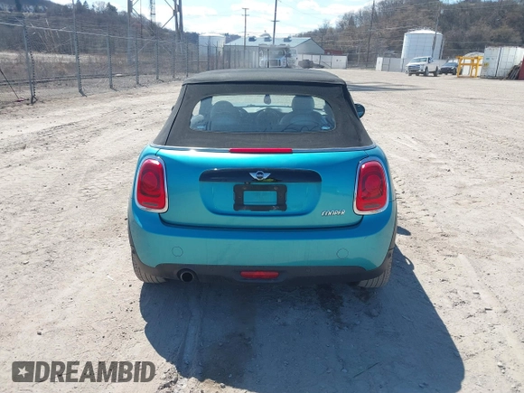 2016 MINI Convertible z VIN WMWWG5C53G3C18842, wystawiony jako IAAI lot #41864596 z przebiegiem 91 253 mil mil oraz . Historia ofert i sprzedaży dostępna na DreamBid. Obrazek 16.