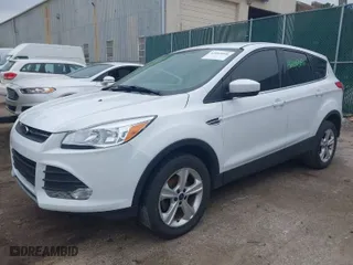 2015 Ford Escape SE with VIN 1FMCU0G78FUB32912, listed as a IAAI auction lot 42003096 with 163,986 mi miles. Bid and sale history available at carsss.com. Image 2.