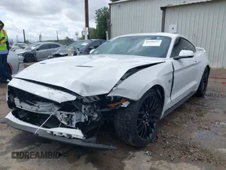 2018 Ford Mustang GT z VIN 1FA6P8CF5J5154590, wystawiony jako IAAI lot #41588857 z przebiegiem 113 805 mil mil oraz . Historia ofert i sprzedaży dostępna na DreamBid. Obrazek 2.