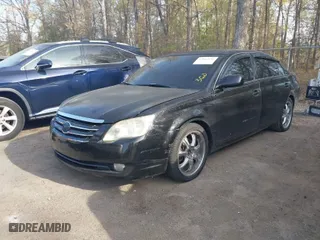 2006 Toyota Avalon XL with VIN 4T1BK36B26U118836, listed as a IAAI auction lot 42062196 with 187,221 mi miles. Bid and sale history available at carsss.com. Image 2.