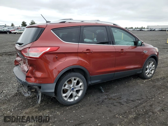 2015 Ford Escape Titanium z VIN 1FMCU9J92FUC37234, wystawiony jako Copart lot #57681855 z przebiegiem 96 973 mil mil oraz Szkoda całkowita • Salvage title. Historia ofert i sprzedaży dostępna na DreamBid. Obrazek 3.