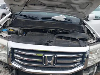 2012 Honda Pilot EX-L with VIN 5FNYF3H51CB012098, listed as a IAAI auction lot 41521214 with 157,701 mi miles. Bid and sale history available at carsss.com. Image 10.
