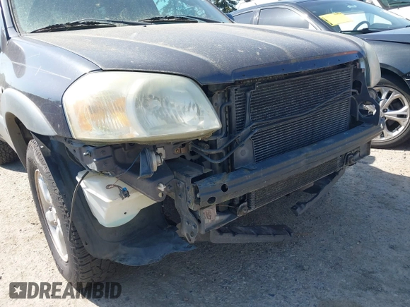 2006 Mazda Tribute i with VIN 4F2YZ02Z16KM00215, listed as a IAAI auction lot 42153919 with 272,828 mi miles and . Bid and sale history available at carsss.com. Image 6.