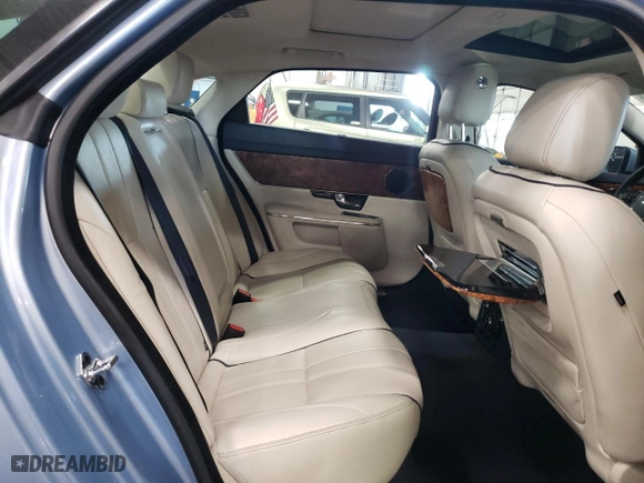 2011 Jaguar XJ with VIN SAJWA2GBXBLV07064, listed as a Copart auction lot 71401724 with NaN miles and Salvage Title. Bid and sale history available at carsss.com. Image 10.